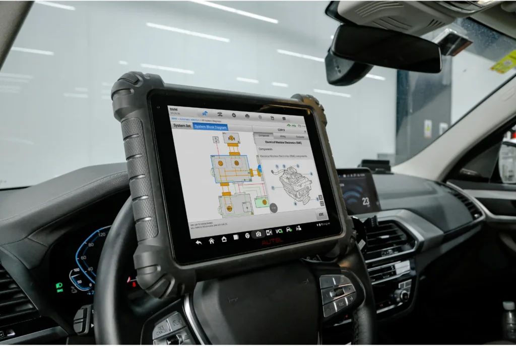 Autel MaxiSYS diagnostic scan during vehicle inspection